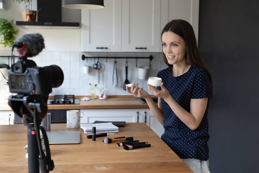 Woman creating video for white label cosmetics brand