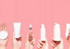 hands holding cosmetics