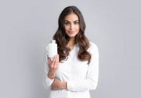 woman holding product